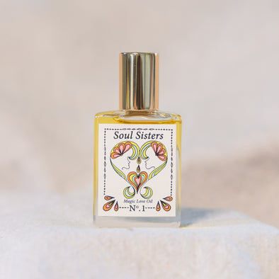 Soul Sisters Magic Love Oil – As Seen on Long Island Medium.Reiki-infused roll-on perfume with gardenia, tuberose & orange blossom. Handcrafted for heart-opening ritual and radiant, magnetic energy.