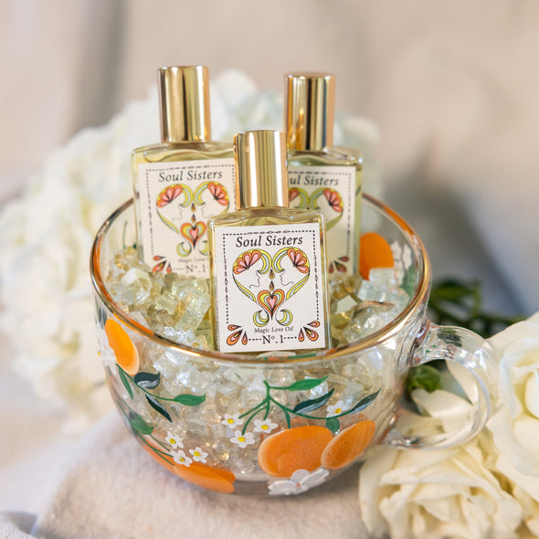 Soul Sisters Magic Love Oil – As Seen on Long Island Medium.Reiki-infused roll-on perfume with gardenia, tuberose & orange blossom. Handcrafted for heart-opening ritual and radiant, magnetic energy.