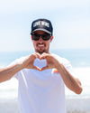 Love Wins trucker hat, hand printed in Laguna Beach CA at The Soul Project  100% Polyester Front, 100% Nylon Mesh Back 5-panel cap Plastic Adjustable Back Snap